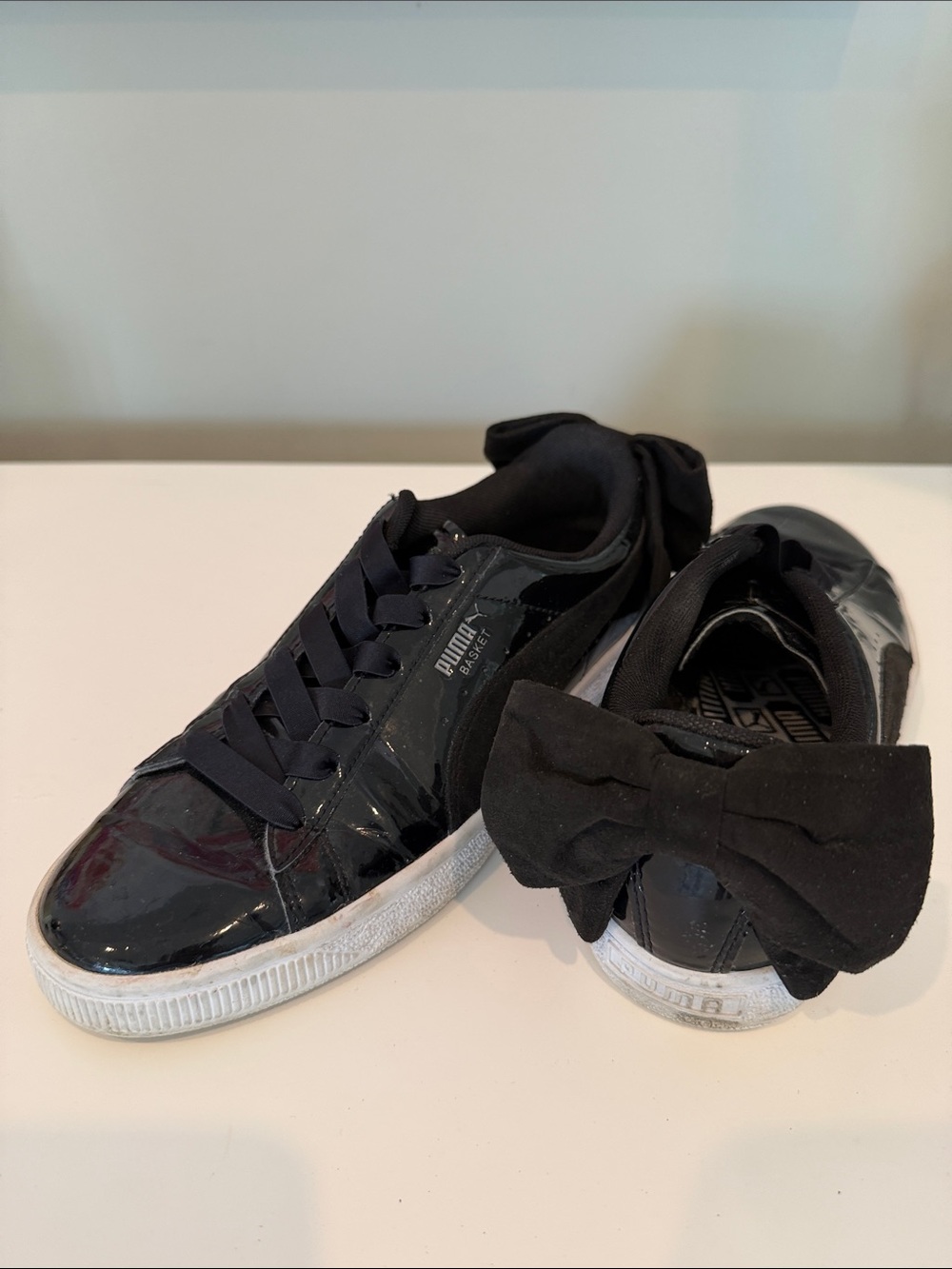 Puma Black Patent Sneakers with Bow Accent